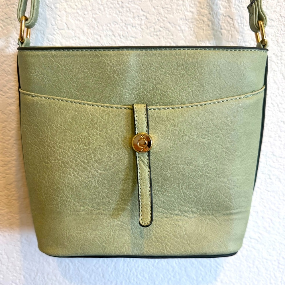Mint green crossbody purse with leopard print interior - Picture 2 of 4